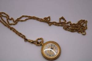 lot 5 image: Bucherer Ladies Vintage Yellow Gold Plate Small Ornate Pocket Watch -For PartsBucherer Ladies Vintage Yellow Gold Plate Small Ornate Pocket Watch -For Parts Ended