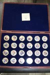lot 6 image: American Mint 2021 The MAGA Movement Donald Trump 24-Piece Coin Collection Set