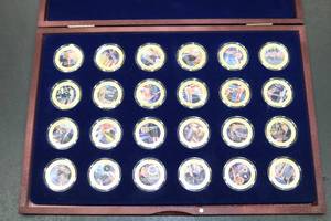 lot 6 image: American Mint 2021 The MAGA Movement Donald Trump 24-Piece Coin Collection Set