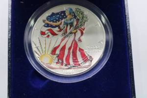 lot 59 image: American Eagle silver dollar 1999 colorized
