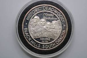 lot 77 image: 1997 STURGIS Indian Model H. Motorcycle Mount Rushmore .999 Silver Round