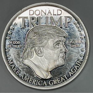 lot 87 image: DONALD TRUMP MAKE AMERICA GREAT AGAIN COMMEMORATIVE COIN PROOF