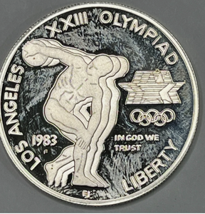 lot 88 image: 1983 S LOS ANGELES XXIII OLYMPIAD LIBERTY SILVER ONE DOLLAR