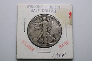 lot 214 image: 1938 Liberty Walking Half Dollar