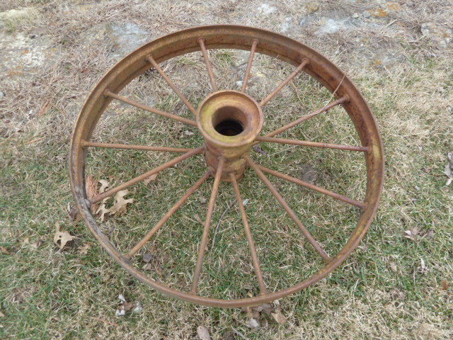 lot 5 image: ANTIQUE METAL WHEEL