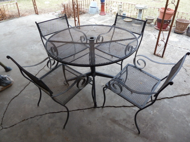 lot 32 image: BLACK METAL OUTDOOR TABLE & 4 CHAIRS