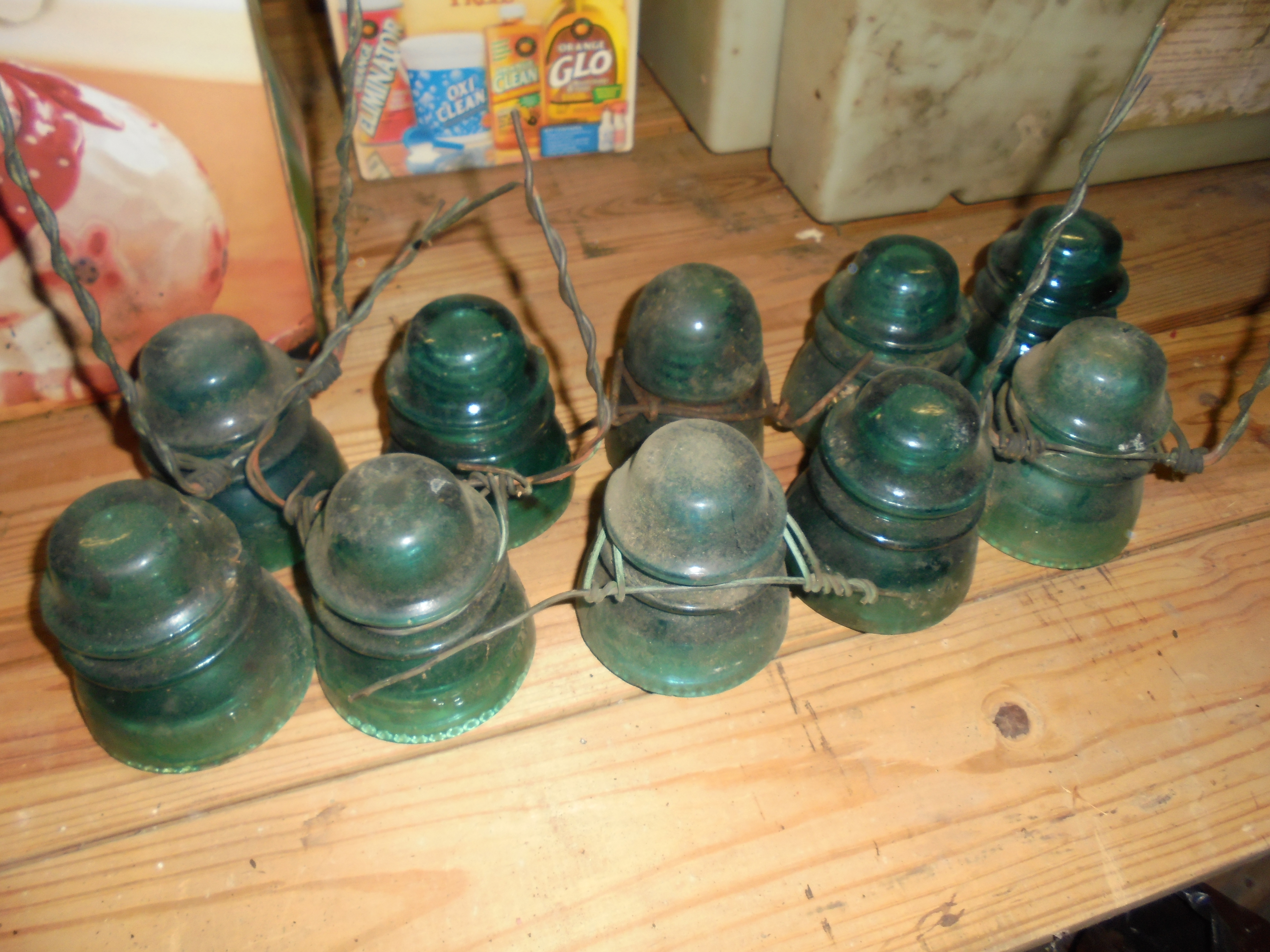 lot 730 image: LOT OF 10 BLUEISH GLASS HEMINGRAY INSULATORS