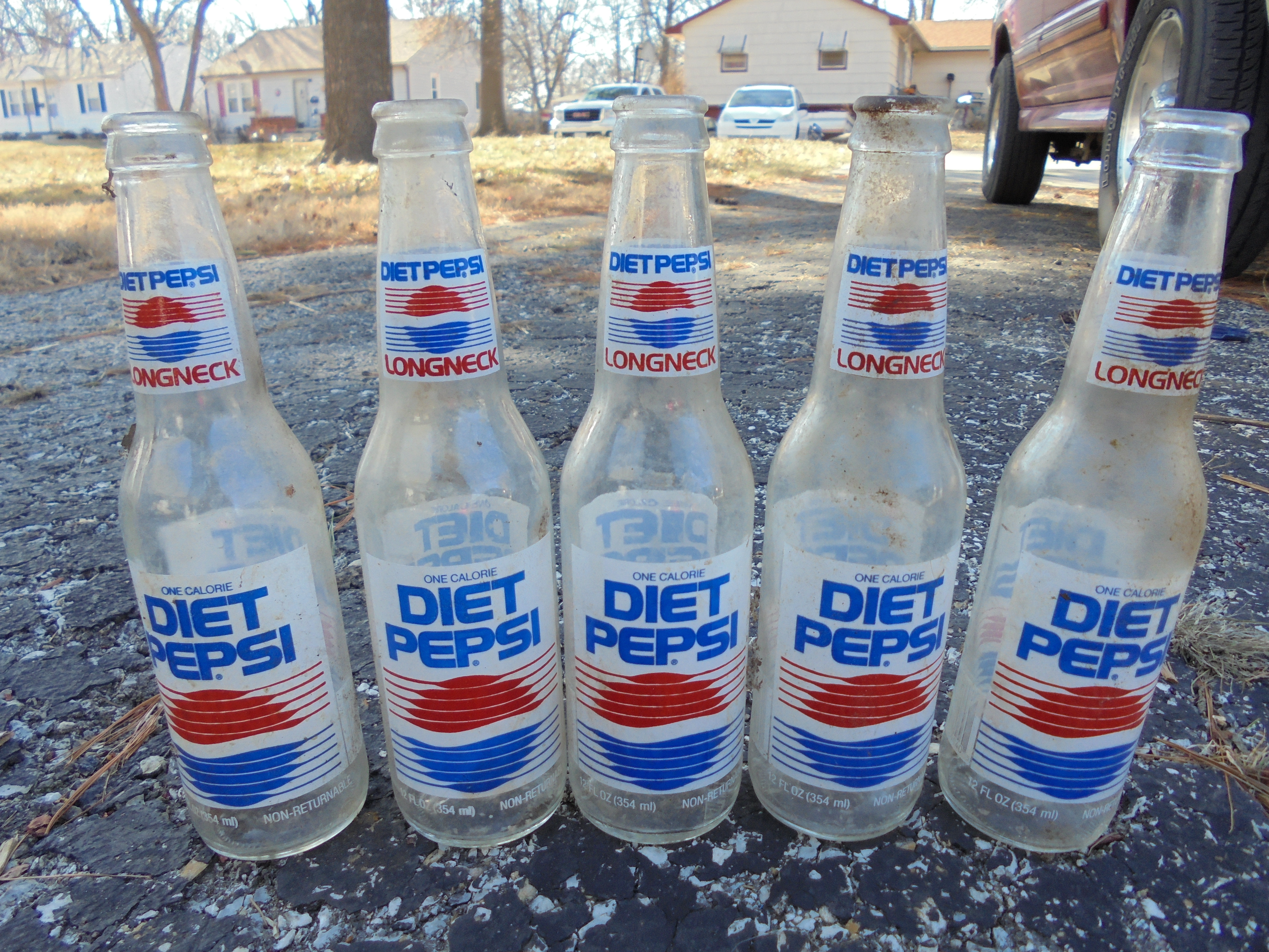 lot 162 image: OLD DIET PEPSI BOTTLES