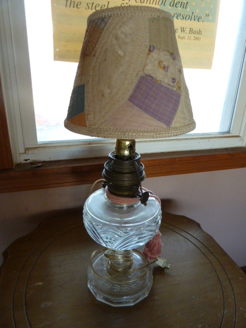 lot 822 image: CUTE OLD LAMP with quilted shade