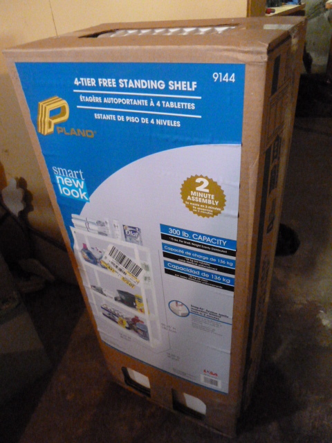 lot 273 image: 4 TIER FREE STANDING SHELF in box