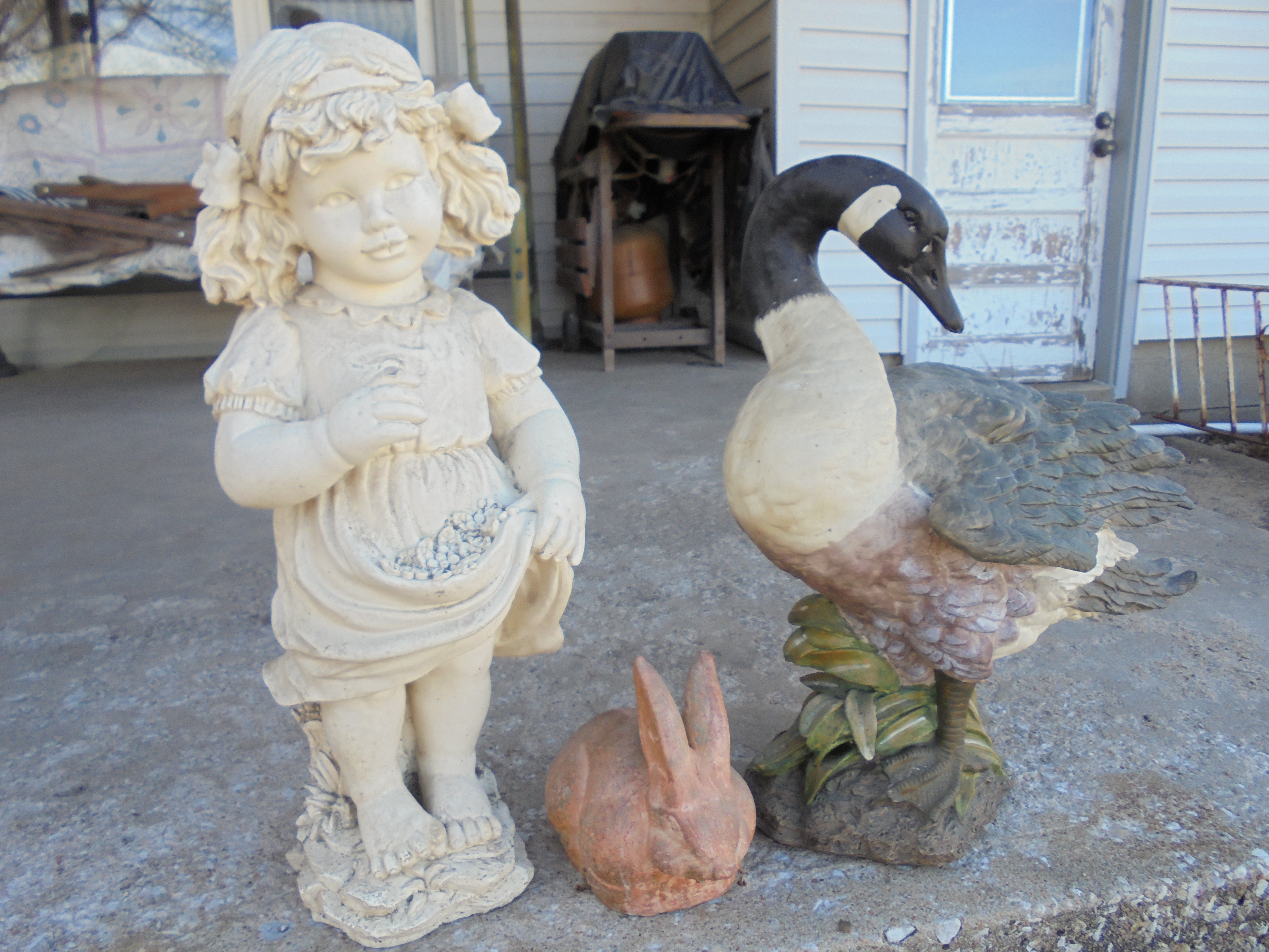 lot 62 image: LITTLE GIRL, BUNNY, GOOSE YARD ART
