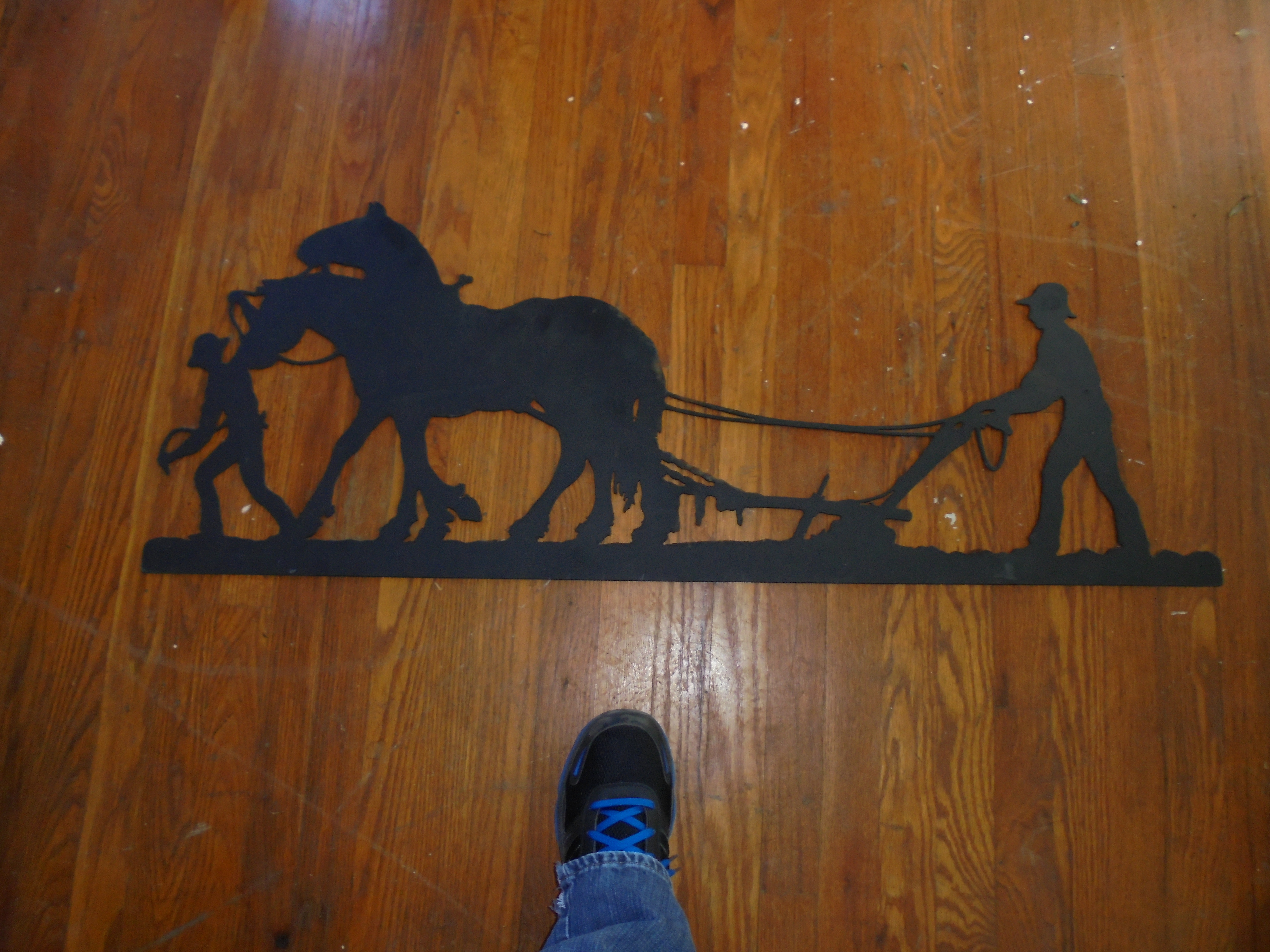 lot 59 image: 4 ft METAL PLOWING WALL ART