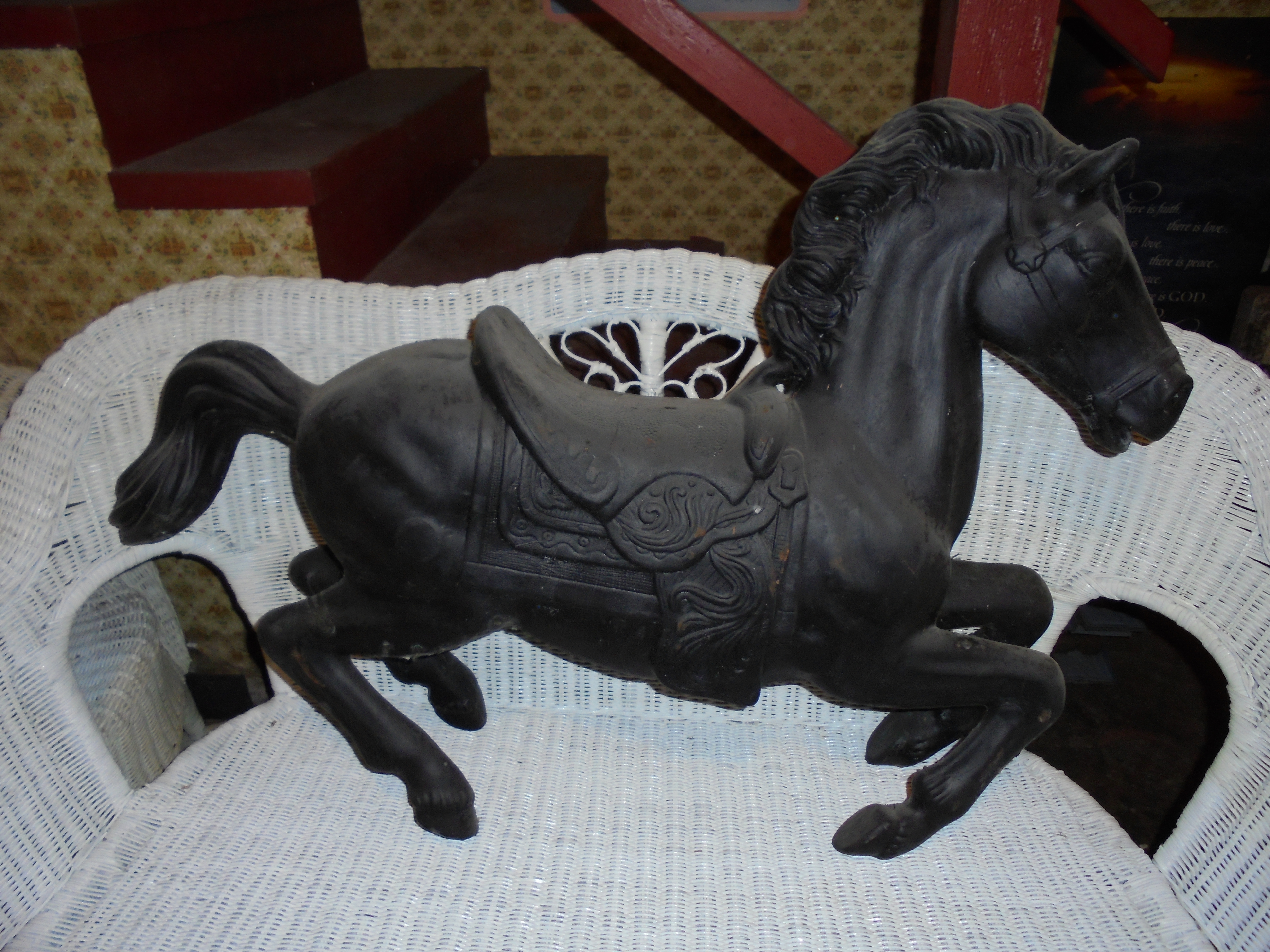 lot 82 image: LARGE BLACK PLASTIC HORSE