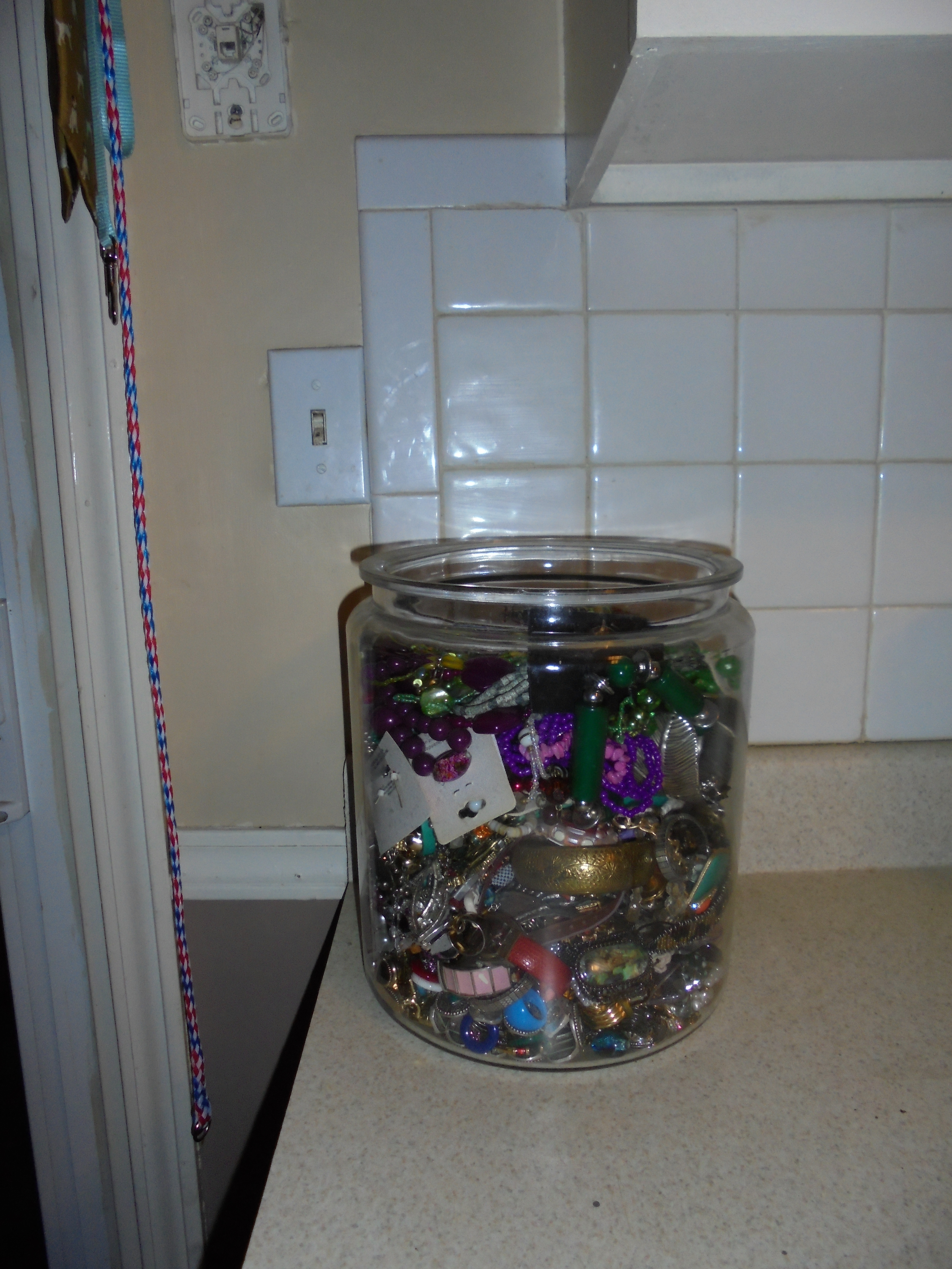 lot 14 image: HUGE GLASS COOKIE JAR FULL OF JEWELRY