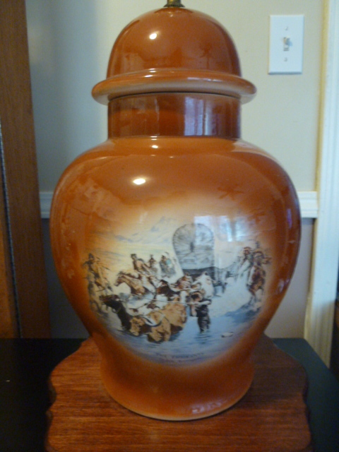 lot 694 image: FREDRIC REMINGTON - THE EMIGRANTS URN STYLE LAMP