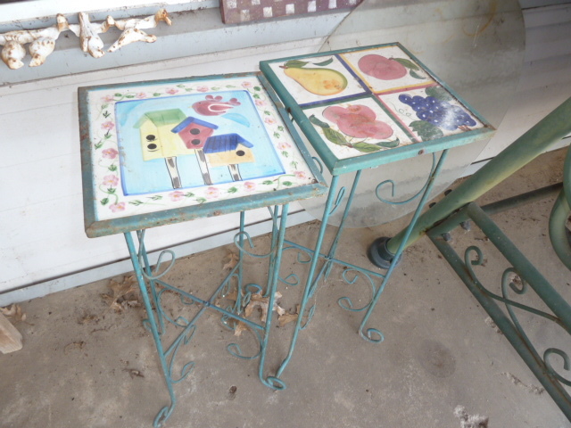 lot 381 image: PAIR OF OUTDOOR PLANT STANDS