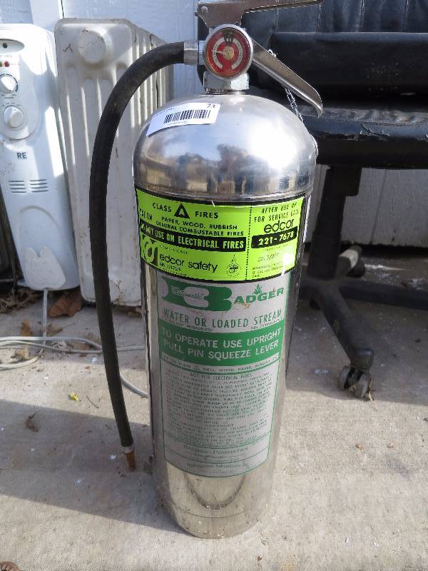 lot 73 image: Metal Fire Extinguisher