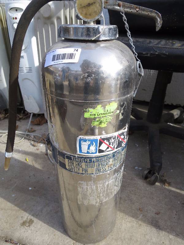 lot 74 image: Metal Fire Extinguisher