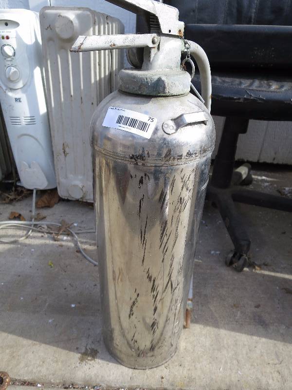 lot 75 image: Metal Fire Extinguisher