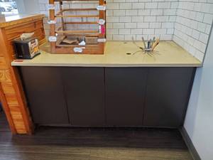 lot 23128 image: Stone Counter With Cabinets