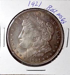 lot 102 image: 1921 Slight Rose Tinted Morgan Silver Dollar