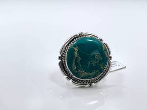 lot 24 image: Sterling Silver and Broken Arrow Turquoise Ring by Betta A. Lee