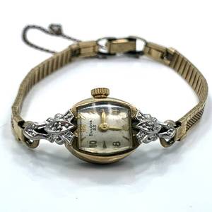 lot 72 image: Antique Ladies 1956 Bulova 23 Mechanical (Wind up) Wristwatch with Diamond Accents