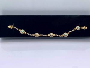 lot 91 image: .925 Sterling Silver Gold Toned Bracelet with Opal