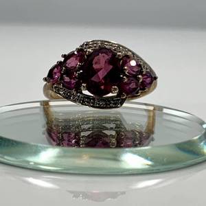 lot 94 image: .925 Sterling Silver Gold Tone  Raspberry Garnet and Crystal Ring