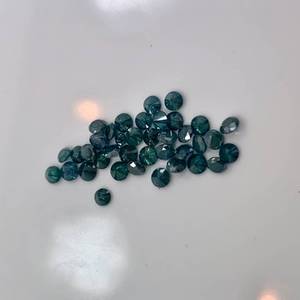 lot 96 image: 5.56ct Treated Blue Diamonds for accents or earrings