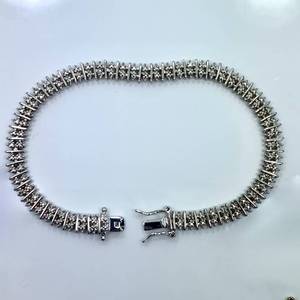 lot 50 image: Sterling Silver Tennis Bracelet