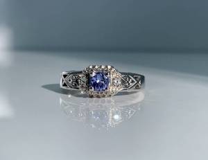 lot 56 image: .25ct Tanzanite  Clear Crystal Accented Sterling Silver Ring