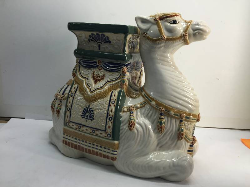 lot 3024 image: CAMEL PLANT HOLDER