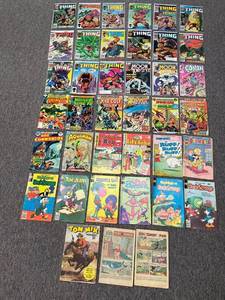 lot 25 image: LOT of 38 Misc Comic Books including The Thing, Hulk, Spider-Man, Whitman