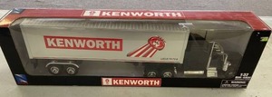 lot 79 image: NEW 132 Die Cast Kenworth Long Hauler Semi Truck