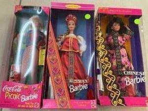 lot 114 image: Coca-Cola Barbie, Chinese Barbie, Russian Barbie