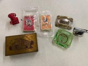 lot 132 image: Lone Ranger Cards, Ashtray, KCMO Tin, Pistol Lighter, Belt Buckle & Miniature Cast Iron Machine
