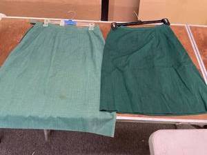 lot 150 image: Vintage Pair Of Dark Green Girl Scout Long Skirts