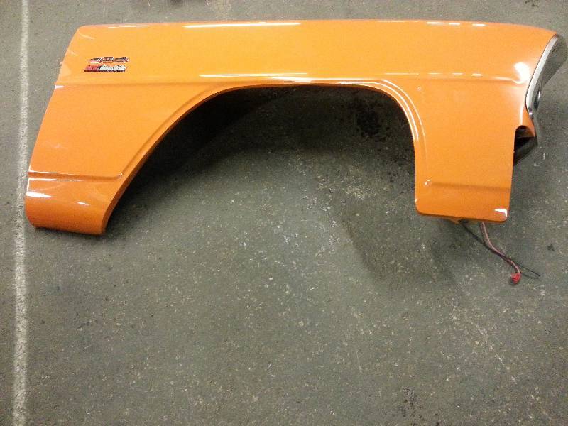 lot 1454 image: Fresh off a drag race 1966 Chevy II Nova and replaced with Carbon Fiber components is this right front fender with special headlight.