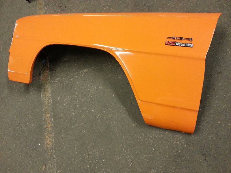 lot 1455 image: Fresh off a drag race 1966 Chevy II Nova and replaced with Carbon Fiber components is this left front fender with special headlight.