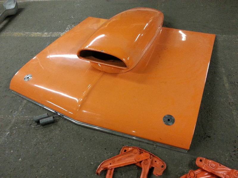 lot 1459 image: Fresh off the 1966 but will fit the 67 Nova Chevy II as well is this fiberglass hood with the wild looking carburetor scoop.