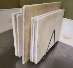 lot 1101 image: Lot of 8 Cutting Boards with Metal Stand