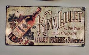 lot 3003 image: Kina Lillet Metal Wall Decoe