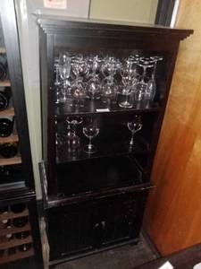 lot 1054 image: Black Wood Cabinet Wine Glasses Sold Separately