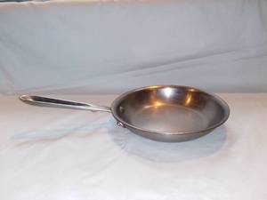 lot 2555 image: All-Clad Stainless Steel 8 Inch Skillet