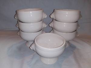 lot 2681 image: Lot of 7 Porcelain Soup Bowls with Stand and Lion Head Handles - Some are Chipped