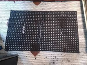 lot 2814 image: Thick Rubber Kitchen Mat - Torn Up but still good for use