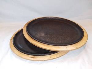lot 2817 image: Lot of 2 Wooden and Cast Iron Skillet Platter