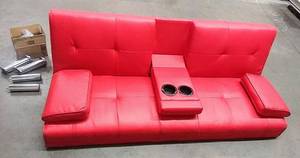 lot 3240 image: 66 Wide Faux Leather Red (Click-Clack) Convertible Sofa wChrome Legs Hidden Drink Holder (Missing Hardware for Legs)