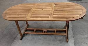 lot 3255 image: Outdoor Teak Oval Extension Table w Unique Built-In Butterfly Pop-Up Leaf & Umbrella Hole (59 W Extends to 78.5 W)